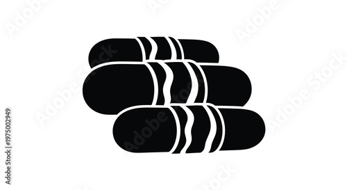 A simple black and white illustration depicts a stack of four elongated capsule shaped objects