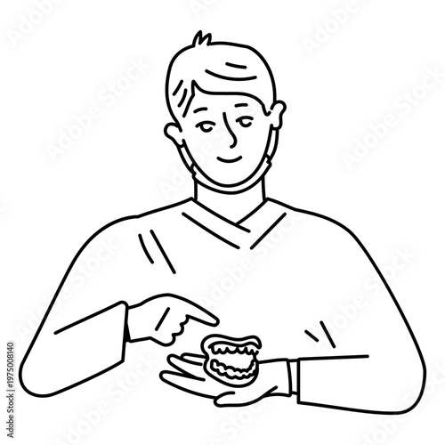 Dentist preparing a removable denture