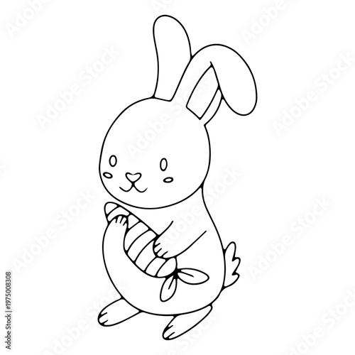 Adorable rabbit holding a carrot