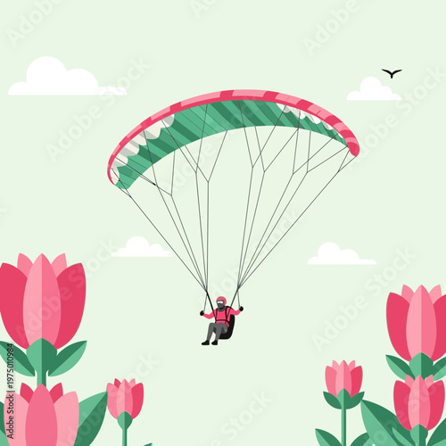 Enjoying a Scenic Paragliding Adventure Amidst Blooming Flowers and Blue Skies