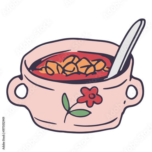 Soup with crunchy croutons in a floral-patterned bowl