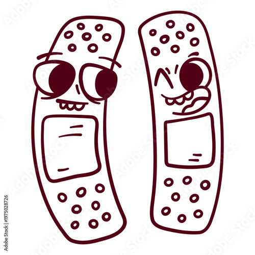 Pair of bandages with faces on them