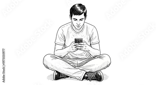 Young man sitting cross-legged on floor, looking at smartphone