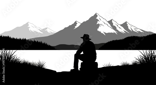 Man sitting on rock wearing hat.
