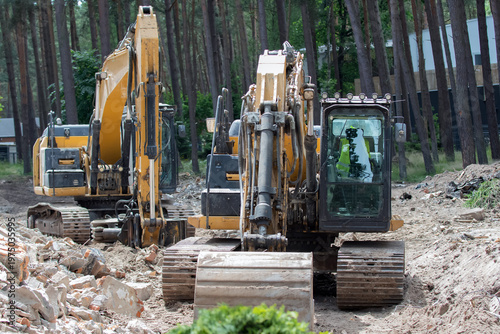 Excavators working