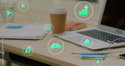 Featuring wooden desk holding open laptop on right, takeaway cup, notebook, smartphone, green icons