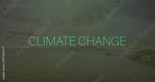 Displaying neon-teal CLIMATE CHANGE text floating over calm coastal ocean, showing scanline texture