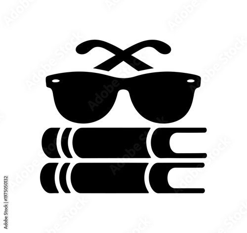 Vector of sunglasses placed over stacked books
