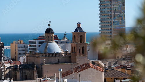 Schilderij op canvas Alicante city skyline with church dome and sea Spain travel