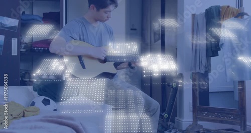 Teen on bed tuning guitar pegs, shifting frets, strumming as light grid pulsing, practicing music