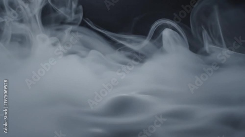 Abstract Background Featuring Swirling White Smoke Patterns Flowing Gently Against a Dark Mysterious Black Backdrop