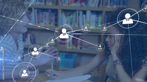 Animation of network of connections over diverse students talking in library
