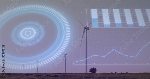 Tall wind turbine spinning as wind increasing and holographic HUDs displaying live performance data