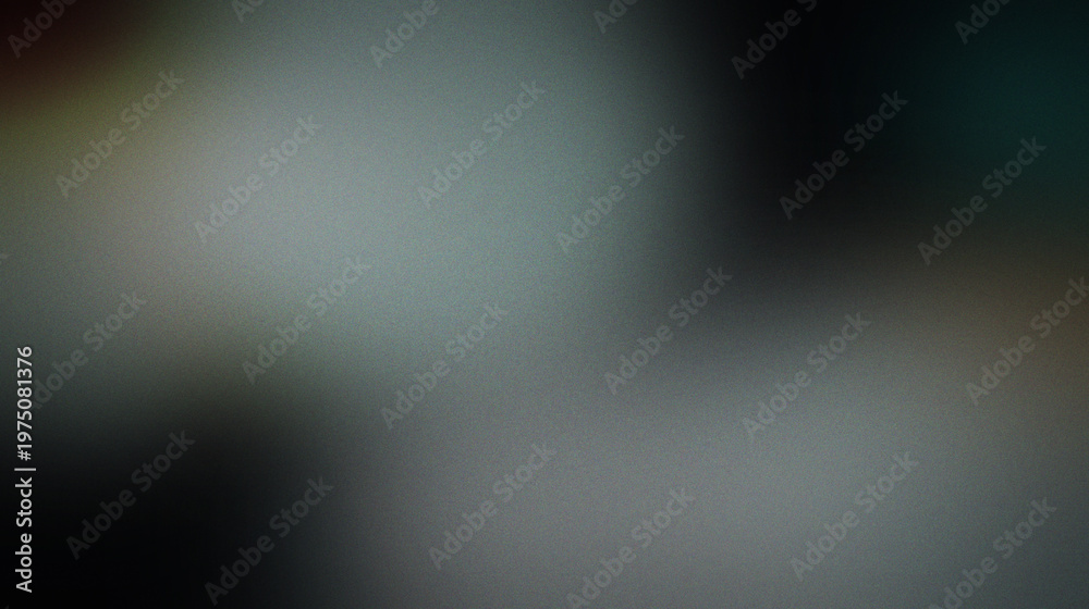 Obraz premium Abstract blurred background, with heavy grain, texture, featuring soft, transitions of muted, grey, dark blue, and subtle warm, brown tones