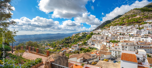 Scenic view of village with white houses in Mijas at sunny day. Costa del Sol, Andalusia, Spain