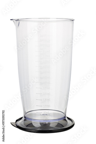 Measuring plastic cup isolated on white background. Close-up