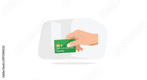 A detailed close-up view of a human hand holding a green plastic credit card with an electronic chip and embossed numbers against a soft neutral background.