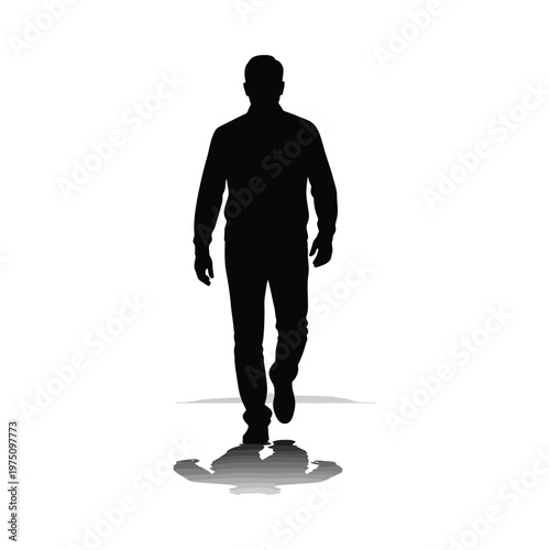 Silhouette of a person walking away from the camera on a flat surface