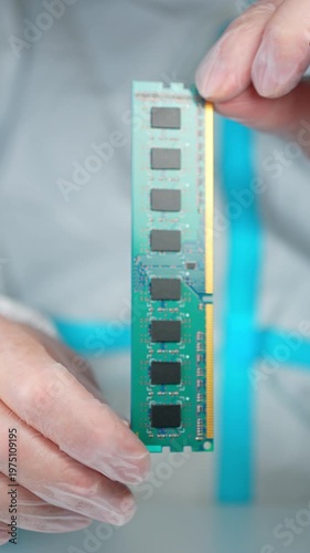 RAM stick with DRAM, Dynamic Random Access Memory chips. Core storage components holds data temporarily for quick CPU access. Storage of binary information using billions of capacitors and transistors