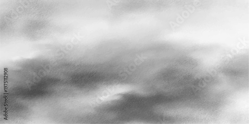 abstract and moody monochrome image of billowing grey clouds, creating a dramatic skyscape.