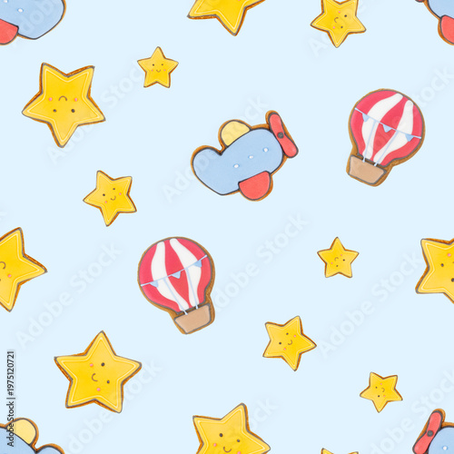 Seamless gingerbread pattern in the form of stars, a balloon and an airplane. Perfect for children's design
