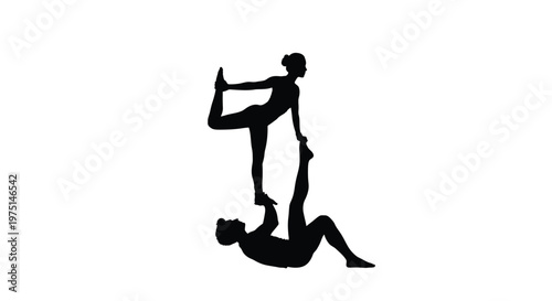 Acrobatic partners balance in a striking black silhouette