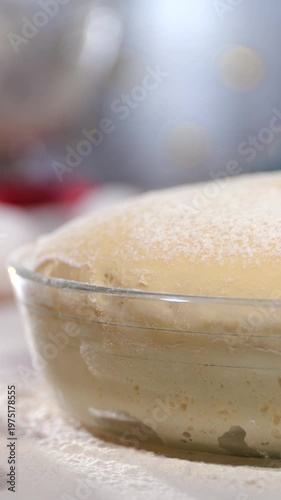 Timelapse footage Bubbly Dough In Warm Kitchen. Capturing Airy Texture Of Rising Yeast Dough In Cozy Kitchen