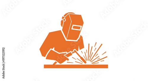 Welding worker in protective gear.
