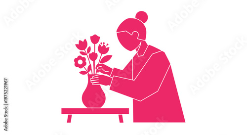Woman arranging flowers in vase.