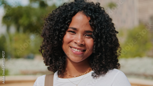 Smiling Woman Outdoors Portrait In Natural Light