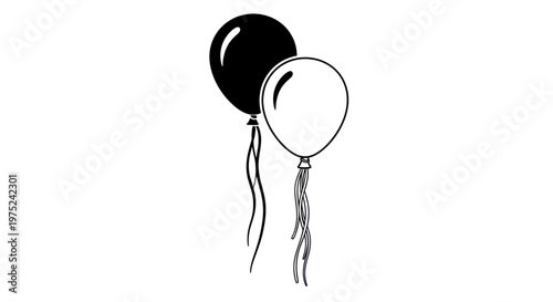 Two balloons, black and white, floating with ribbons against a white background