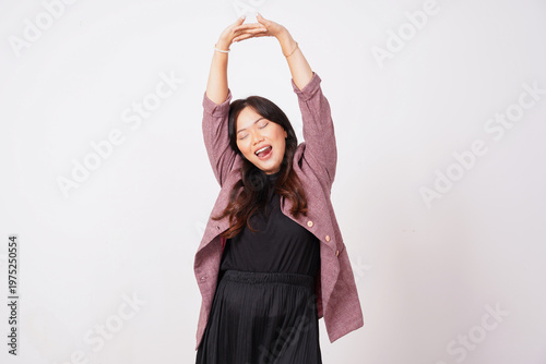 Asian Woman In Blazer Stretching Her Arms With Happy Expression
