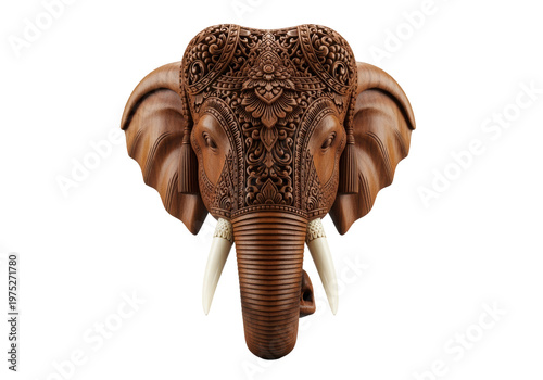 Intricately carved majestic wooden elephant head sculpture in polished dark mahogany with traditional asian ornate patterns, product photography on seamless pale gray background. Concept of