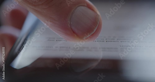 Extreme Close-up of finger scrolling through content on a smart phone

