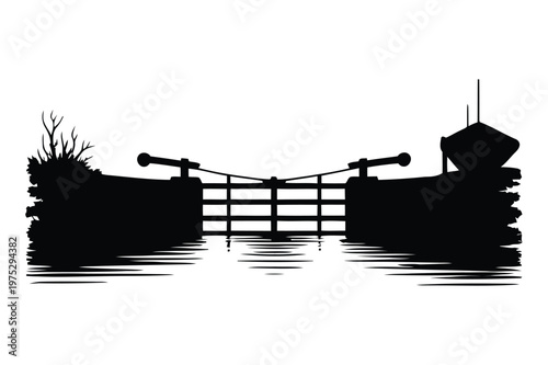 Silhouette of a canal lock gate with watchtower and water reflection, waterway