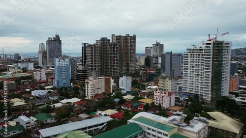 High rise buildings overshadow local homes, corporate dominance in Cebu City