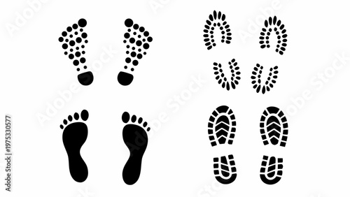 Various black footprints and shoe sole patterns displayed on a white background