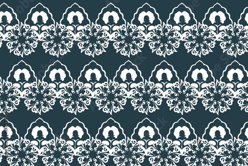 Navy blue ornamental floral lace seamless pattern featuring intricate white botanical borders and geometric medallions