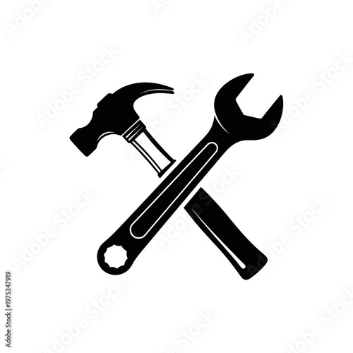 Crossed hammer and wrench silhouette on white background