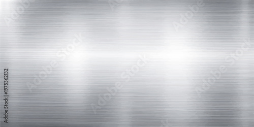 A shiny brushed metal texture background with a grey stainless steel plate pattern featuring an industrial silver aluminum surface and metallic chrome reflection