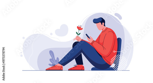 Man sits comfortably on the floor while browsing his smartphone and holding a small flower in a relaxed indoor setting.
