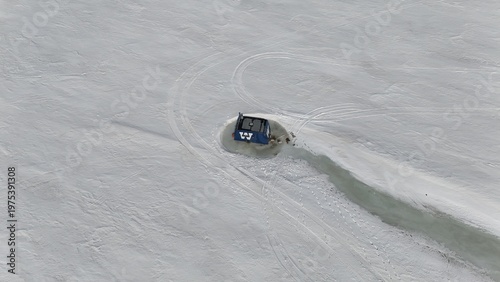 Ice Fishing Hut Frozen In Ice On Lake Manitoba