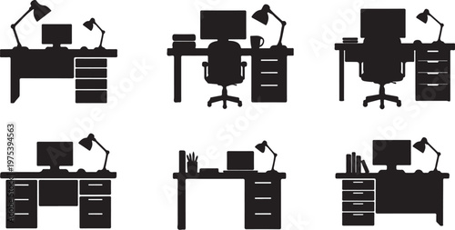 Six black office desks with computers and lamps arranged