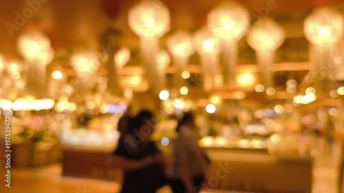 Blurred people' activities in food court.