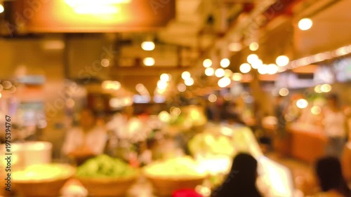 Blurred people' activities in food court.