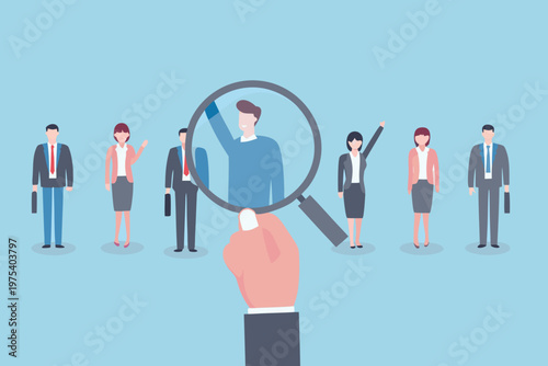 A hand uses a magnifying glass to focus on a man in a group