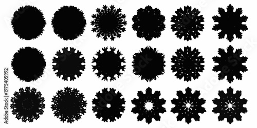 Collection of abstract black ink blot shapes resembling foliage