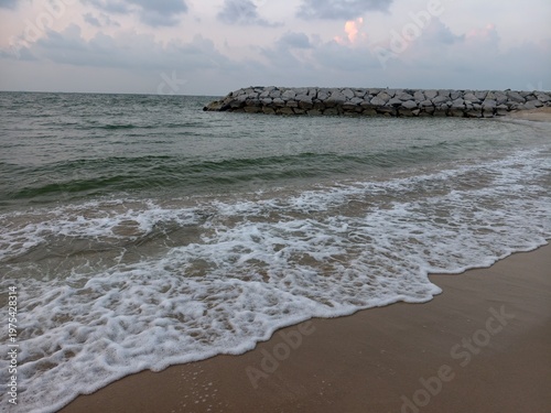 The sea and the bright sandy beaches.