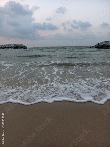 The sea and the bright sandy beaches.