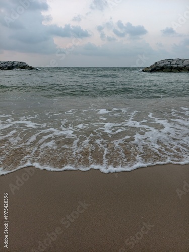 The sea and the bright sandy beaches.